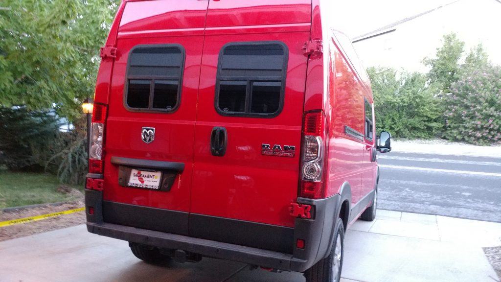 zoom out, rear view of ram promaster van